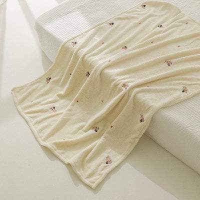 couverture bébé beige en velours avec écureuil