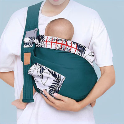 écharpe de portage verte - bébé dans bras maman