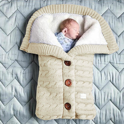 gigoteuse bébé en tricot beige - nid d'ange