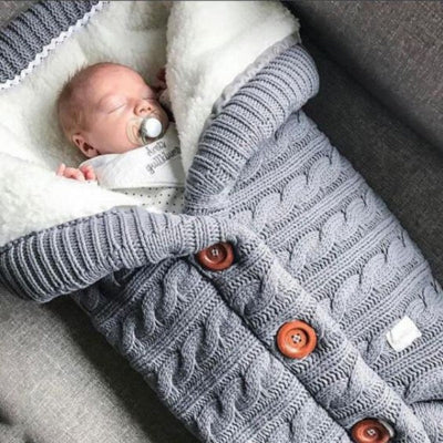 gigoteuse bébé en tricot gris - nid d'ange