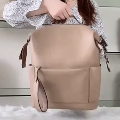 sac langer en cuir blanc ou marron pour maman - gif