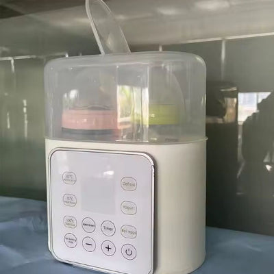 chauffe biberon multifonctionnel 9 en 1