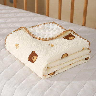 couverture bébé en velours - motif patte et tête d'ours
