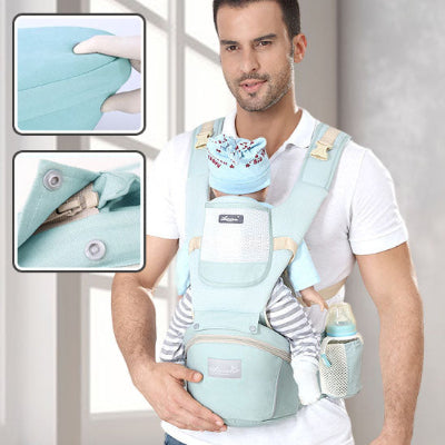 papa avec bebe dans porte bebe