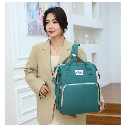 SAC A LANGER VERT | BERCEAU PLIABLE™ - Bébé Touriste