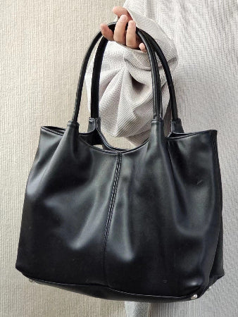 sac à langer en cuir noir