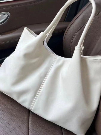 sac à langer en cuir blanc