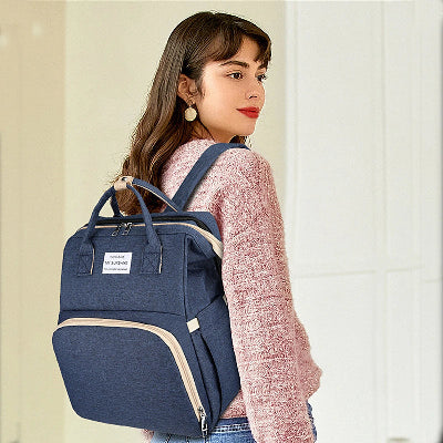 sac à langer lit